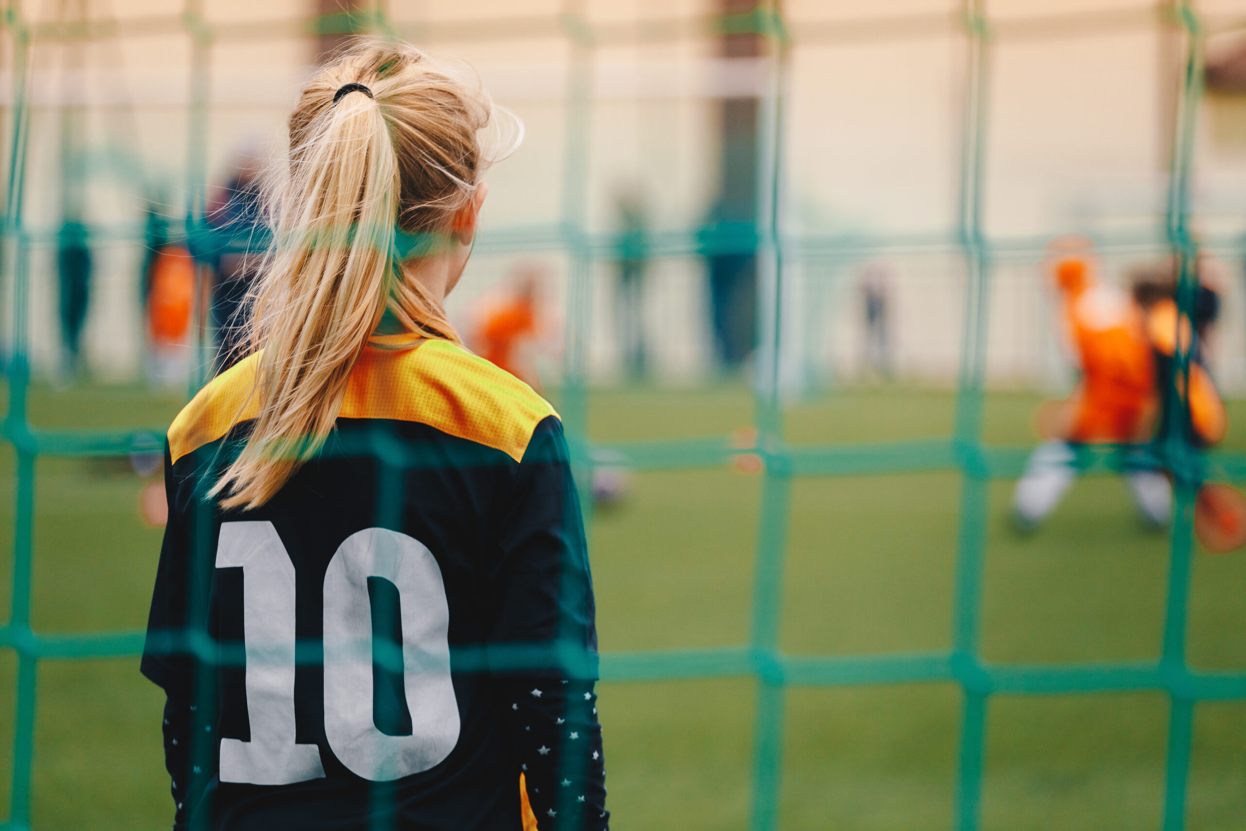 soccer,girl,playing,game,as,a,goalie.,youth,female,football soccer,girl,playing,game,as,a,goalie.,youth,female,football